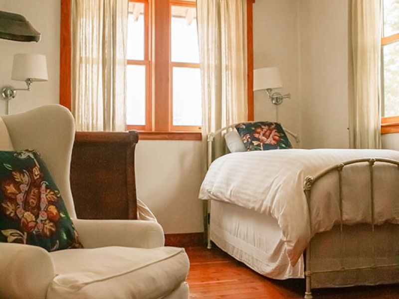 West bedroom with three twin beds