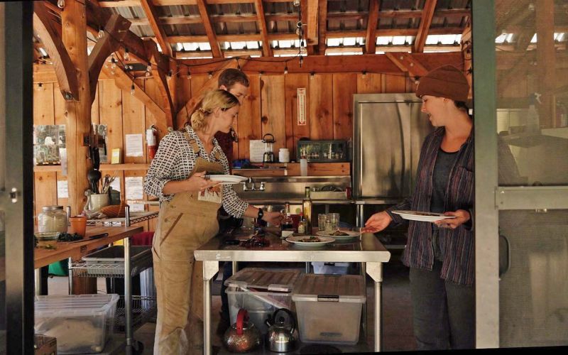 Campers preparing a meal in campground cookhouse