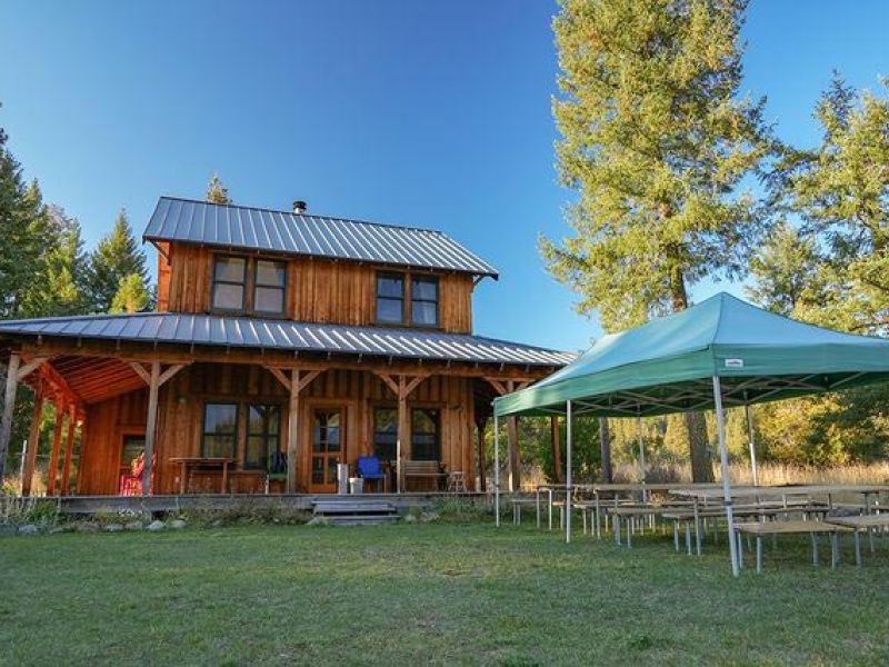 Outdoor tent with seating for event held at Meadow House