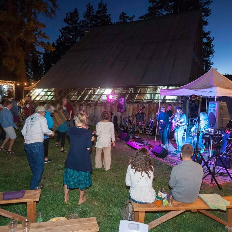 Live band plays into the night at summer special outdoor event at the ranch
